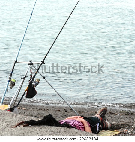 lazy man fishing on sea
