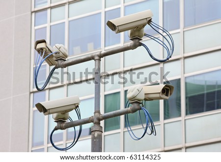 Surveillance security video camera in urban setting