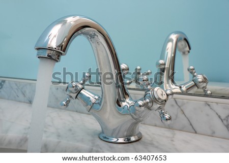 Water running from an open water faucet