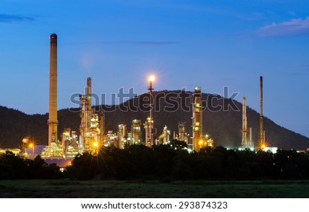 Oil Refinery factory in the night times , petrochemical plant , Petroleum
