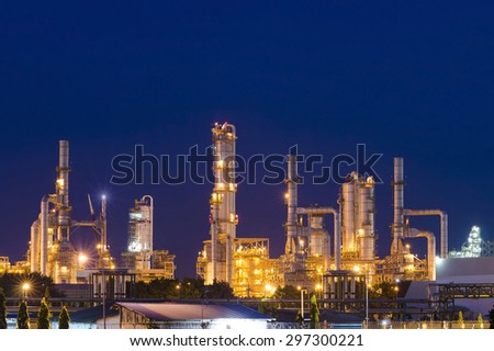 Oil Refinery factory in night , petrochemical plant , Petroleum , chemical