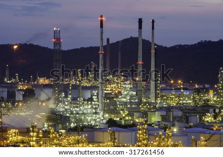Oil Refinery factory at twilight , petrochemical plant , Petroleum
