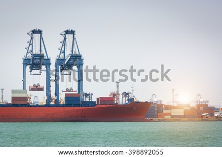 Containers loading by crane in the morning , Trade Port , Shipping