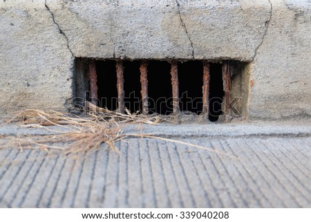 Dry drain channel in the concrete road