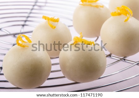 some homemade marzipan pralines with orange flavor