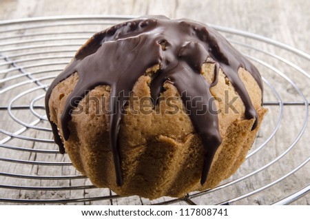 home made chocolate muffin on a baking rack