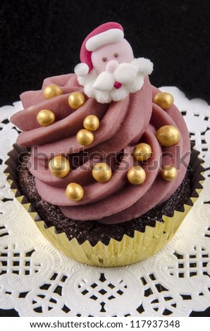 christmas chocolate cupcake with golden sugar balls