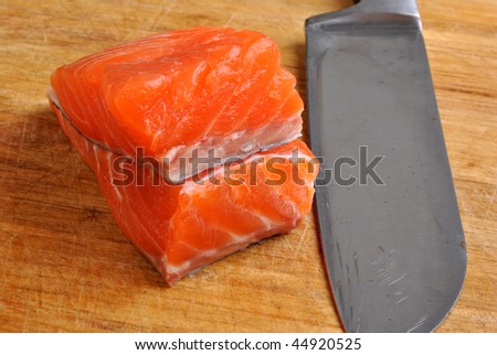 organic wild salmon steak and a knife