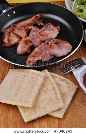 stock-photo-slices-organic-irish-potato-bread-and-bacon-49040143.jpg