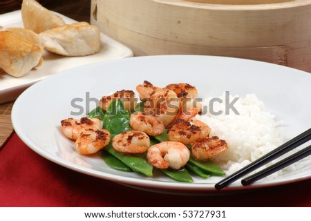grilled shrimps with some organic rice and beans