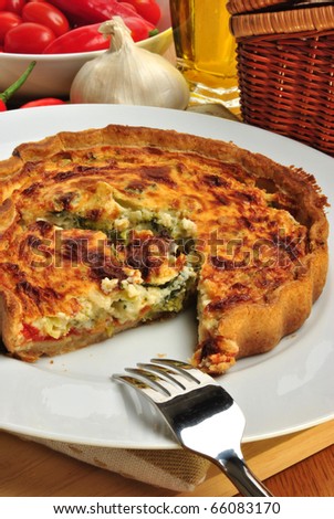 quiche with broccoli and tomato ready to eat