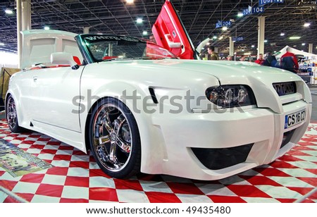 stock photo BUDAPEST MARCH 19 White tuning car with special doors and