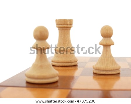 White chess figures on a chessboard isolated on white