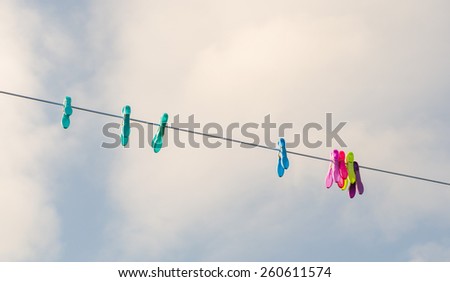 Cloths line with pegs and sky