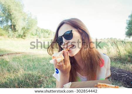 Picnic on the grass with pizza