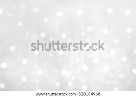 Soft Beautiful Abstract White Grey Background with Bokeh lights. Beautiful blurred Winter background with copy space. Grayscale Texture