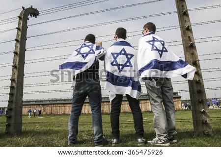 OSWIECIM, POLAND - APRIL 16, 2015: Holocaust Remembrance Day next generation of people from the all the world meets on the March of the Living in German death camp in Auschwitz Birkenau, in Poland