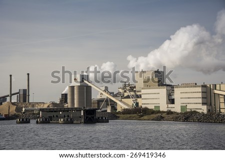Port of IJmuiden, Noord-Holland/Netherlands - April 13-04-15 - Steel factory TataSteel located at the shoreside and is in full proces at the moment. Tata steel producing metal for the car industry