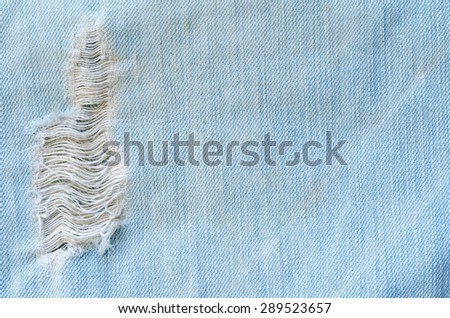 Vintage Old Denim Fabric - Ripped Jeans Pale Soft Blue Color Texture Background