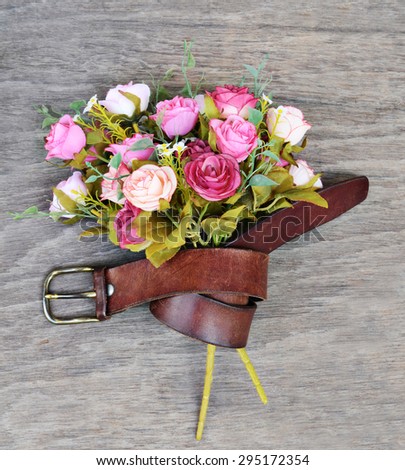 Vintage Leather Belt Strap to Fit for Flowers Decoration Craft Idea on Wooden Floor Soft Focus - White Edge Square Texture Background