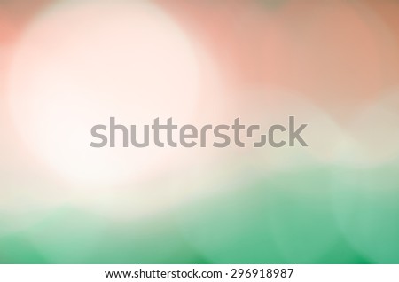 Abstract Light Bokeh Pale Red and Green Pastel Soft Color Blurred Background