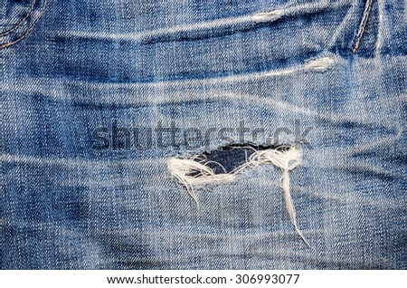 Vintage Dark Old Denim Fabric - Ripped Jeans Pale Soft Blue Color Texture Background