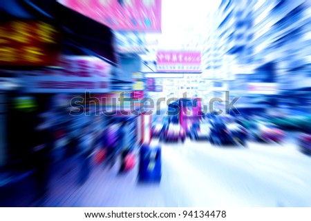 people and car rushing on the street in motion blur