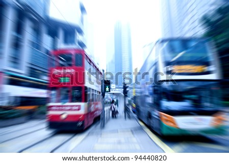 bus rushing on the street in motion blur
