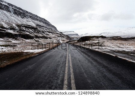 Open frozen roads in icelands east fjords in mid winter