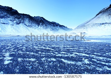 Arctic abbiss in the frozen East Fjords mid-winter Iceland