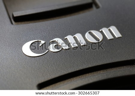 Taipei, Taiwan - August 3, 2015: Cap of Canon lens close up. Canon Inc. is a Japanese multinational corporation specialized in the manufacture of imaging and optical products,