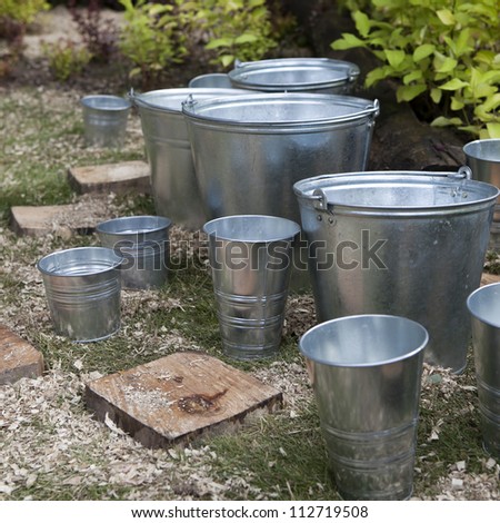 zinc bucket of water standing