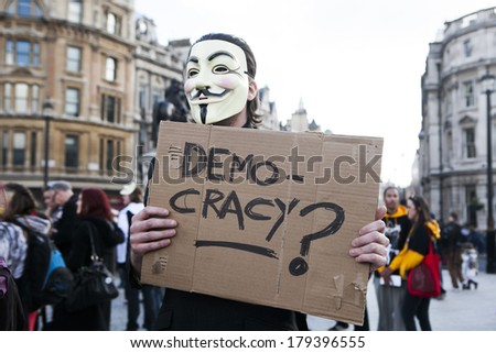 LONDON, UK - MARCH 1TH 2014. London protesters march against worldwide government corruption. In London on 1th March 2014.