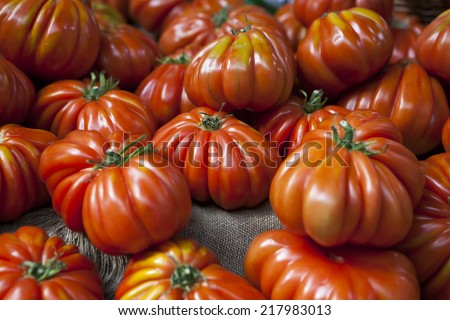 Lufa Farms Beefsteak Tomato. Market stall with lots of tomatoes