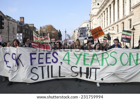 LONDON, ENGLAND - NOVEMBER 19: Students take part in a protest march against fees and cuts in the education system on November 19, 2014 in London, England.