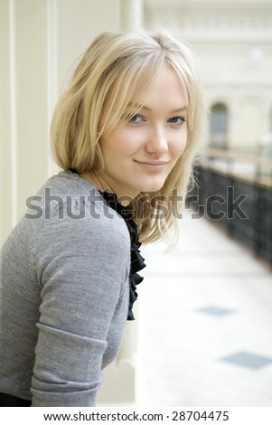 portrait of young smiling woman in good mood