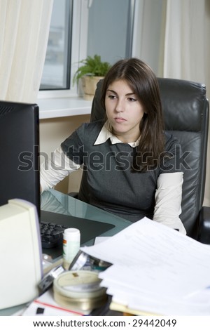 concentrated secretary working used computer. Office people