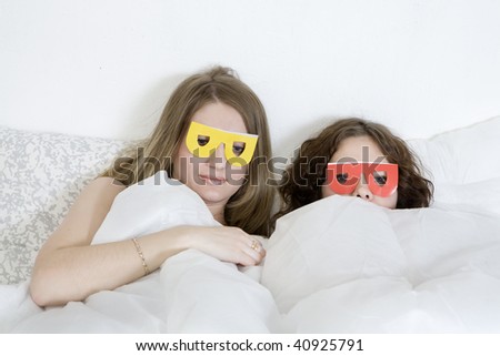 young serious  woman in bed