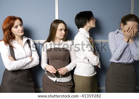 Business team over modern office background. Clerks console their colleague. Job Interview. One of them became hysterical