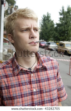 Dr. <b>Isaac Tyler</b> - stock-photo-blond-teen-boy-smoking-cigarette-in-street-43282705