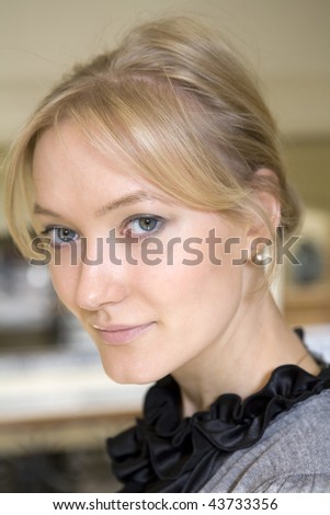 blond tired young woman resting after shopping in big store