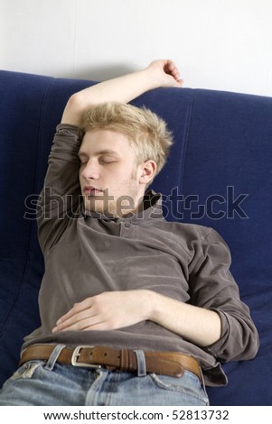 Sleeping Blond Man On Sofa Stock Photo 52813732 : Shutterstock