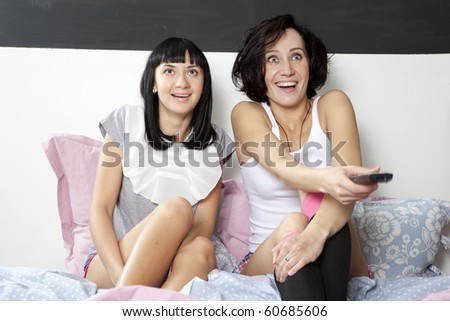 domestic life: 2 girls watching a comedy movie