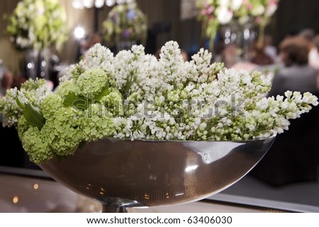stock photo hydrangea and lilac in vase Decoration of wedding table