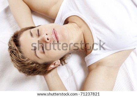 Young pretty girl sleeping on pillow. Sweet dreams