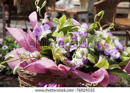 violet and green orchids in wedding bouquet