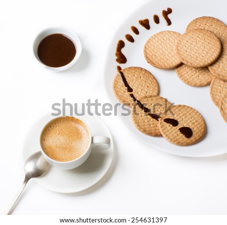 white Cup of black coffee and cake whith chocolatto  isolated on white table