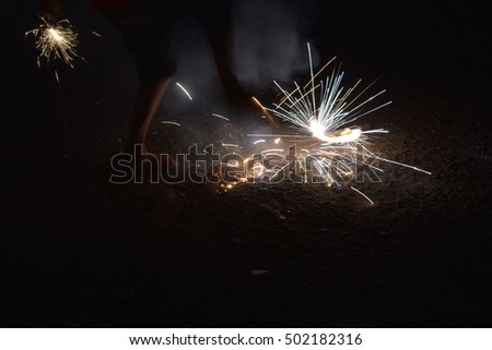 Diwali, crackers, fire of cracker explosion on black background