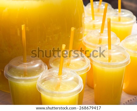 Orange juice in fast food closed cups