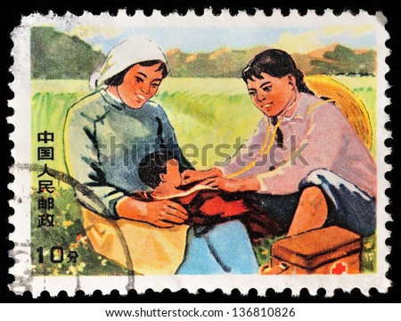 CHINA - CIRCA 1963: stamp printed by China, shows two female with baby, circa 1963